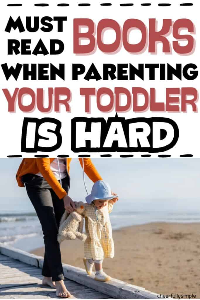 Pinterest pin with the text, "must read books when parenting your toddler is hard" with a picture of a woman holding her toddlers hands while walking along a sidewalk at the beach