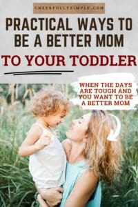 Pinterest pin with the text, "Practical Ways to be a Better Mom to Your Toddler" with a picture of a young mom outside playing in a field holding and talking to her toddler son