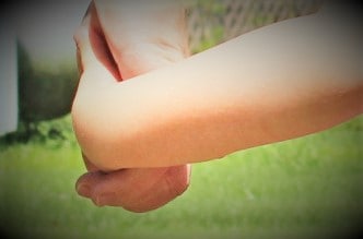 mom and toddler holding hands