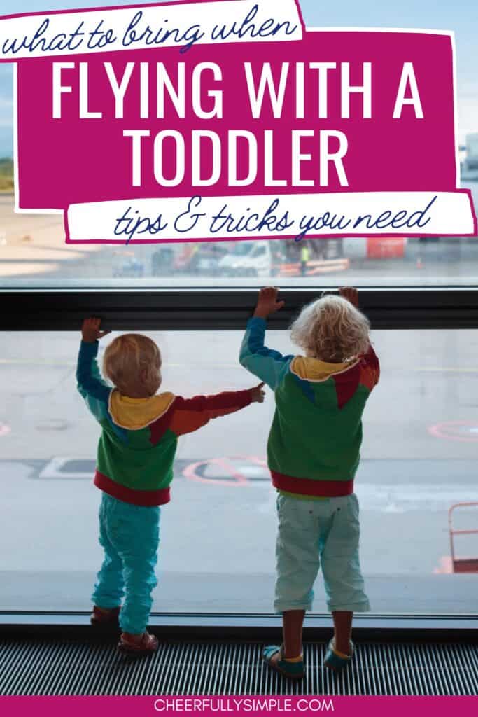what to bring when flying with a toddler Pinterest pin