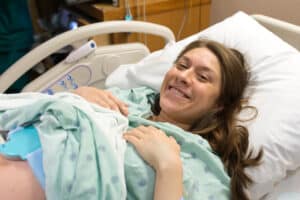 woman in hospital gown in labor