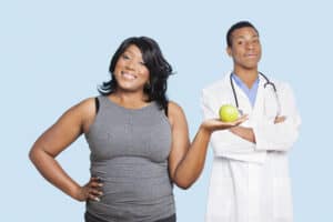 picture of a pregnant woman with her doctor