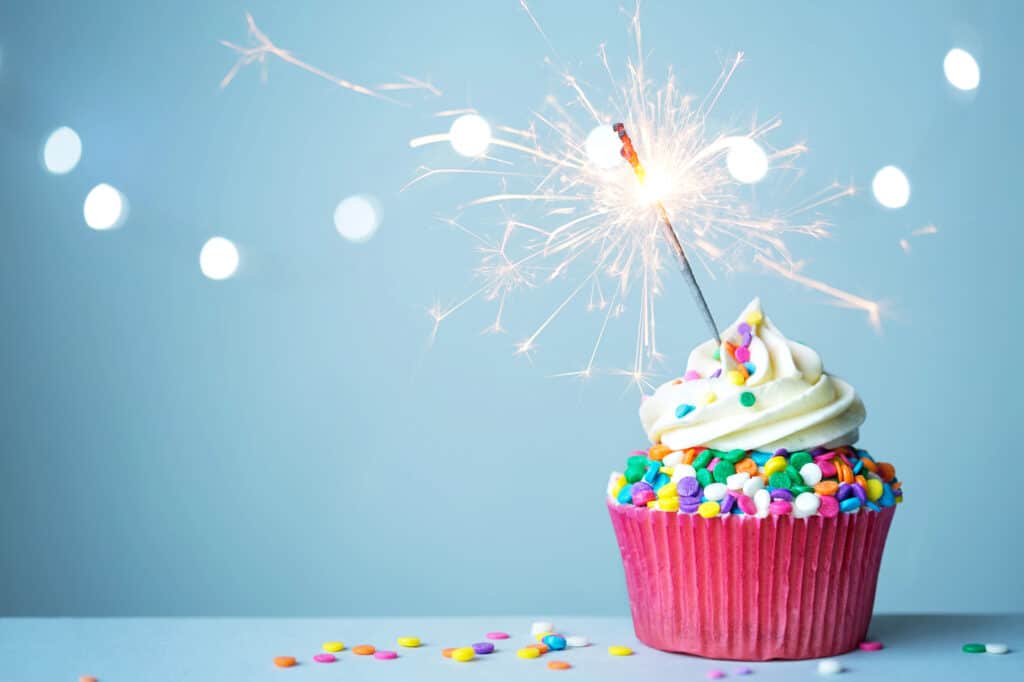 birthday cupcake with sparkler for a birthday celebration at home