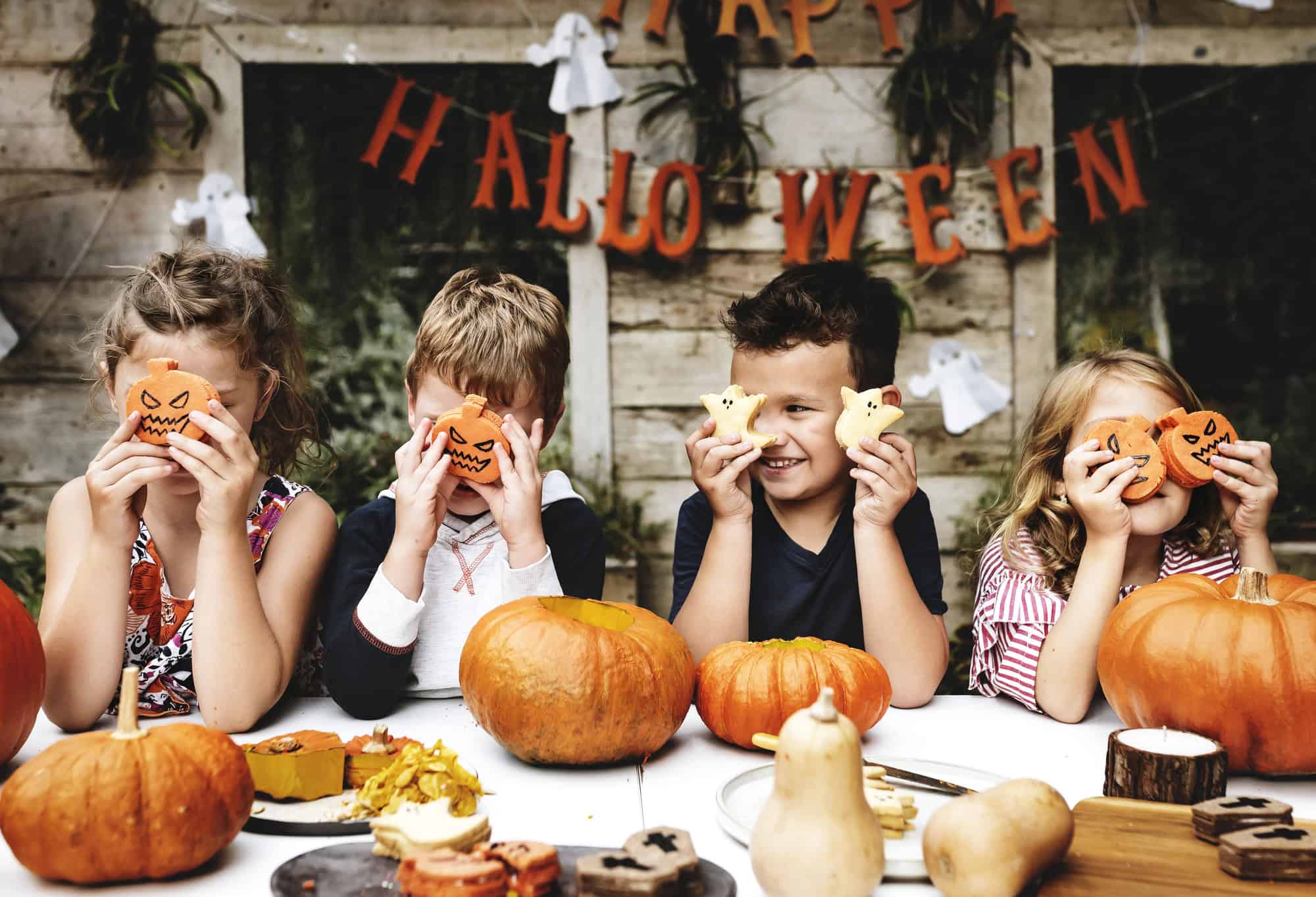kids dressed up doing Halloween crafts and games as a Trick-or-Treat alternative