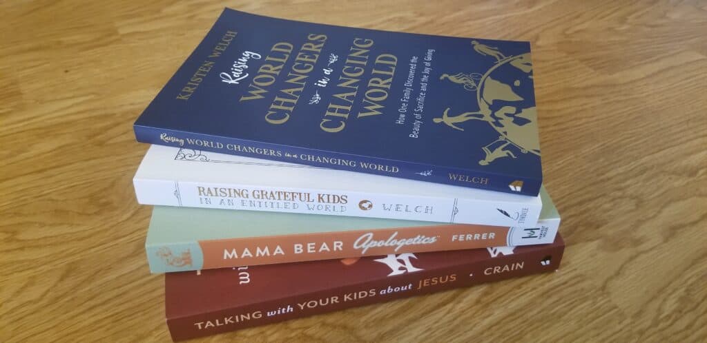 picture of a stack of the best Christian parenting books