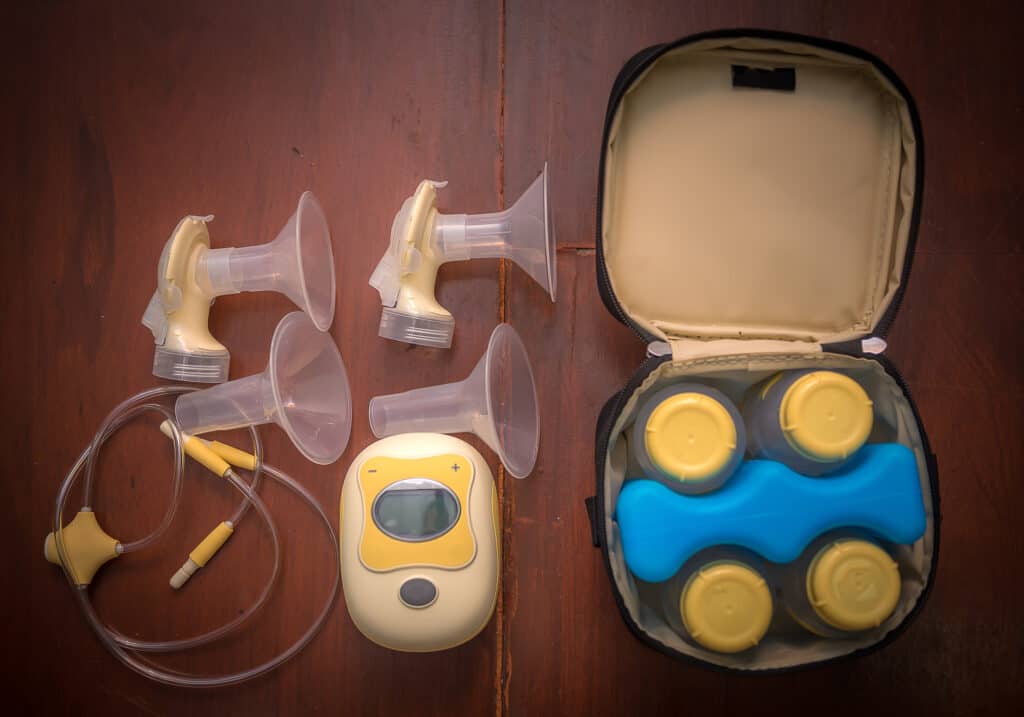breast pump with breast milk cooler and bottles