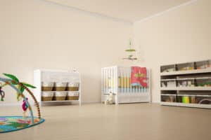 picture of a simple baby nursery with a crib and storage shelf
