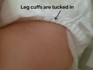 picture showing leg cuffs of diaper are tucked in