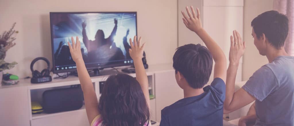 children doing worship together at home